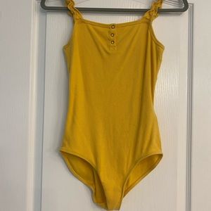 Abercrombie Kids mustard yellow bodysuit